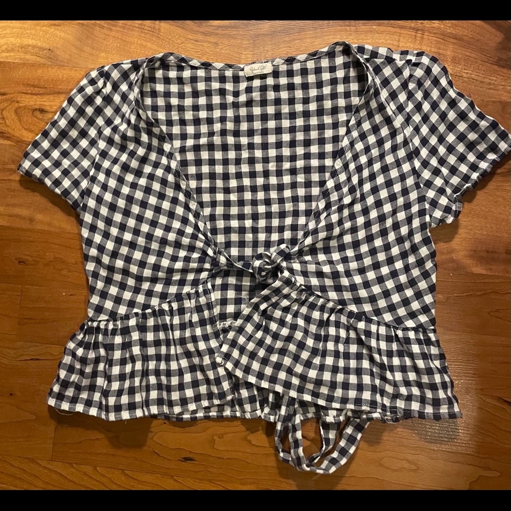 John Galt size 0 shirt.